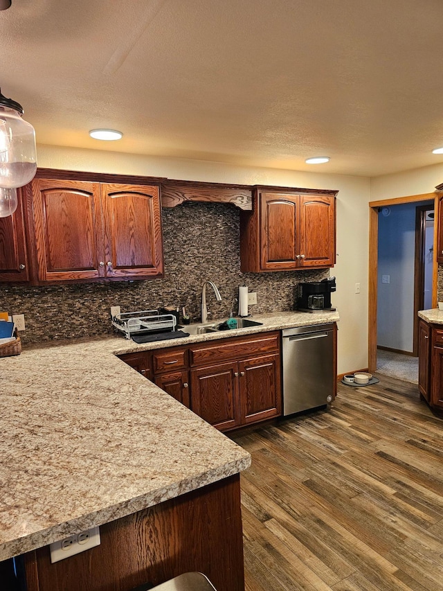 1005 8th Ave SW, Pipestone, MN 56164 - kitchen with stainless steel dishwasher, a sink, light countertops, backsplash, and recessed lighting