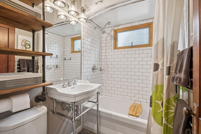 4613 34th Ave S, Minneapolis, MN 55406 - bathroom with shower / tub combo, toilet, and tile walls