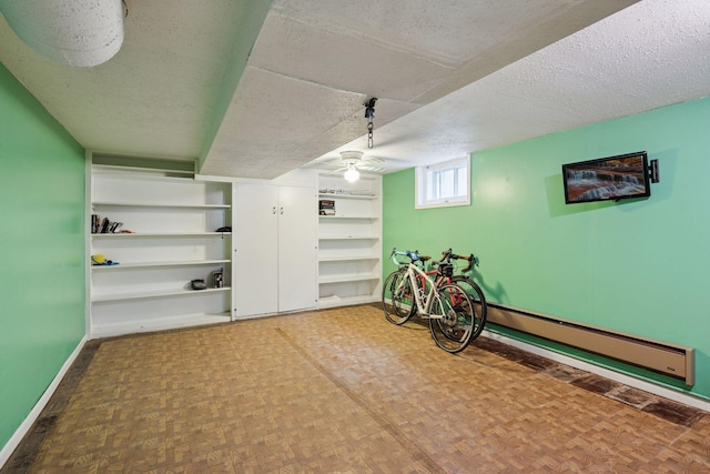 4613 34th Ave S, Minneapolis, MN 55406 - below grade area with baseboards, a textured ceiling, and built in shelves