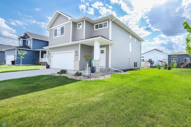 view of front of home with a garage, concrete driveway, and a front yard