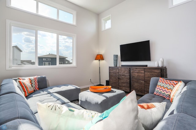 living room featuring baseboards