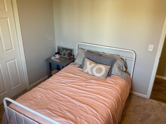 1218 8th Ave NW, Perham, MN 56573 - bedroom featuring baseboards and carpet