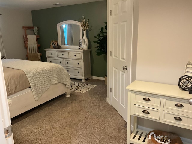 1218 8th Ave NW, Perham, MN 56573 - bedroom featuring dark colored carpet