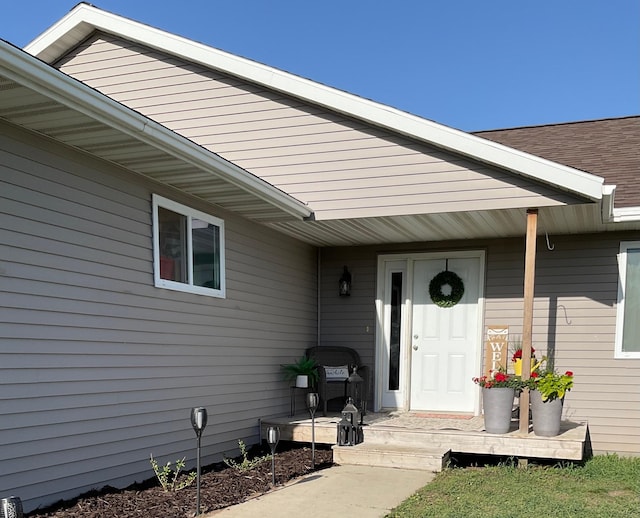 1218 8th Ave NW, Perham, MN 56573 - view of exterior entry with a porch