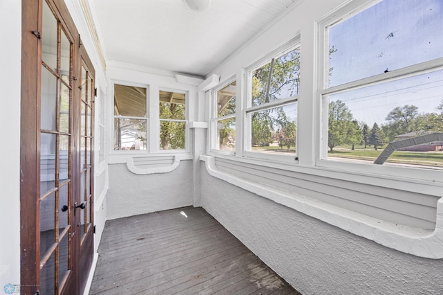 12 2nd St E, Ada, MN 56510 - unfurnished sunroom featuring hardwood / wood-style flooring and french doors