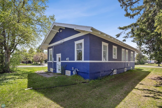 12 2nd St E, Ada, MN 56510 - view of property exterior featuring a yard