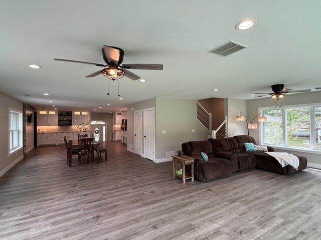 4615 County Road 5 NW, Byron, MN 55920 - living area featuring a ceiling fan, recessed lighting, wood finished floors, and baseboards