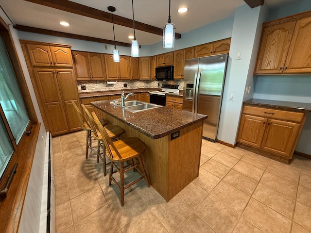 4615 County Road 5 NW, Byron, MN 55920 - kitchen with stainless steel refrigerator with ice dispenser, range with electric stovetop, a sink, black microwave, and brown cabinets