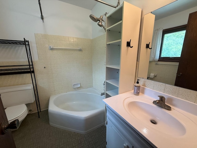 4615 County Road 5 NW, Byron, MN 55920 - full bath with toilet, vanity, tile walls, and tile patterned floors