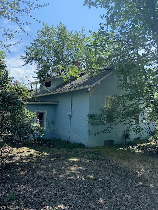 2224 42nd St, Minneapolis, MN 55407 - view of side of property with stucco siding
