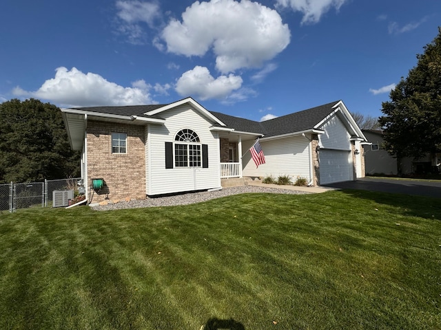 6158 Forest Boulevard Trl, Wyoming, MN 55092 - ranch-style house with brick siding, an attached garage, driveway, central AC, and a shingled roof