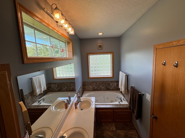 6158 Forest Boulevard Trl, Wyoming, MN 55092 - bathroom with a textured ceiling, a whirlpool tub, and double vanity
