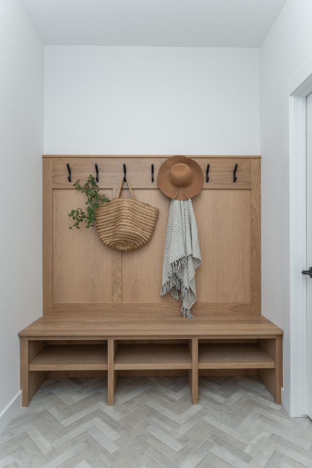 mudroom featuring baseboards