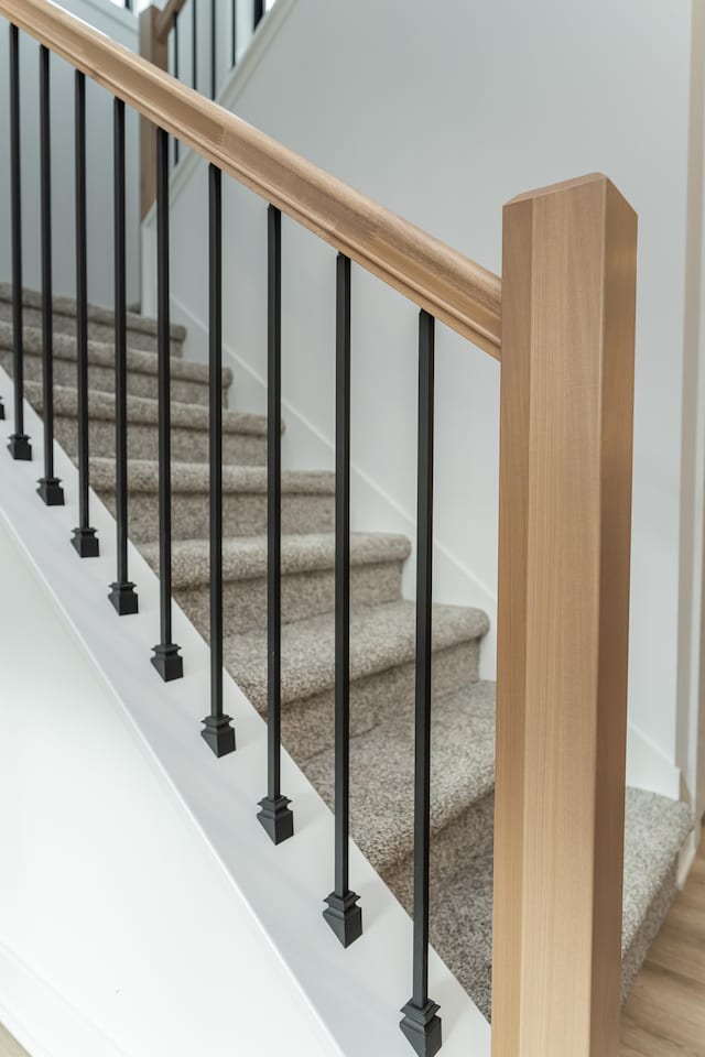 stairway with wood finished floors