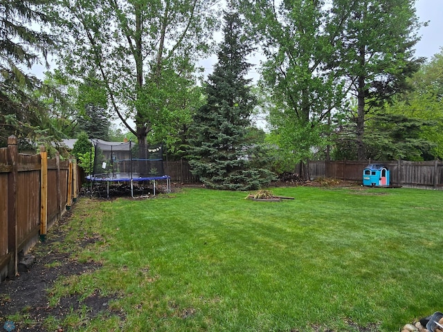 2105 7th St S, Moorhead, MN 56560 - view of yard with a trampoline