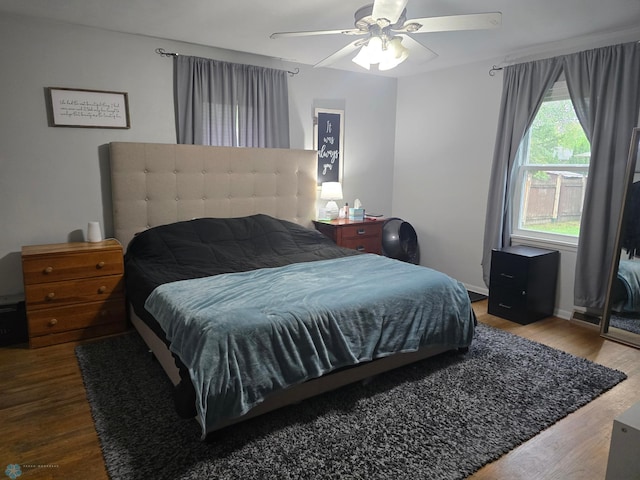 2105 7th St S, Moorhead, MN 56560 - bedroom with wood finished floors and a ceiling fan