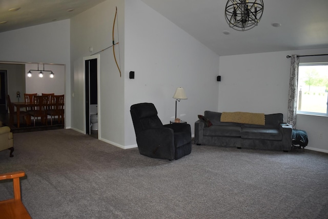 1706 Alcott Ave, Buse Twp, MN 56537 - carpeted living room featuring lofted ceiling and baseboards