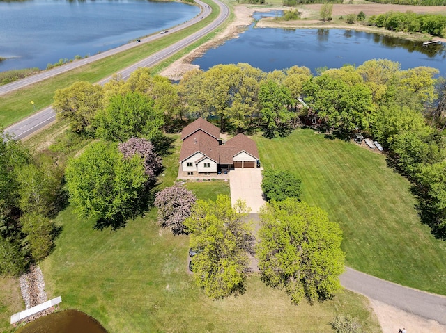 view of subject property with a nearby body of water