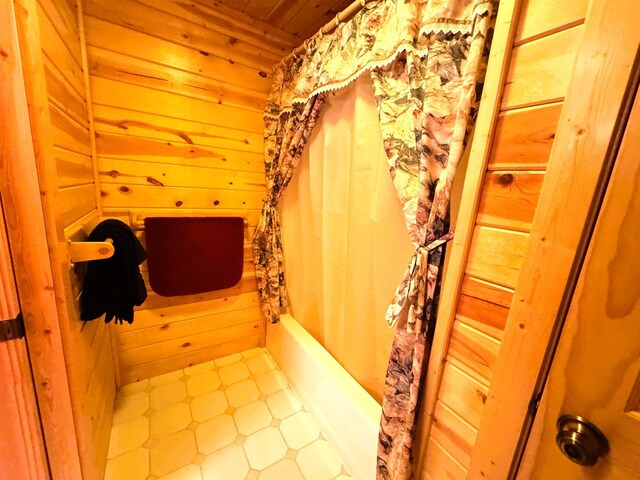 35918 410th Ave SE, Queen Twp, MN 56542 - bathroom featuring wooden walls, shower / bath combination with curtain, and wood ceiling