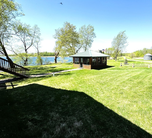 35918 410th Ave SE, Queen Twp, MN 56542 - view of grassy yard with a water view