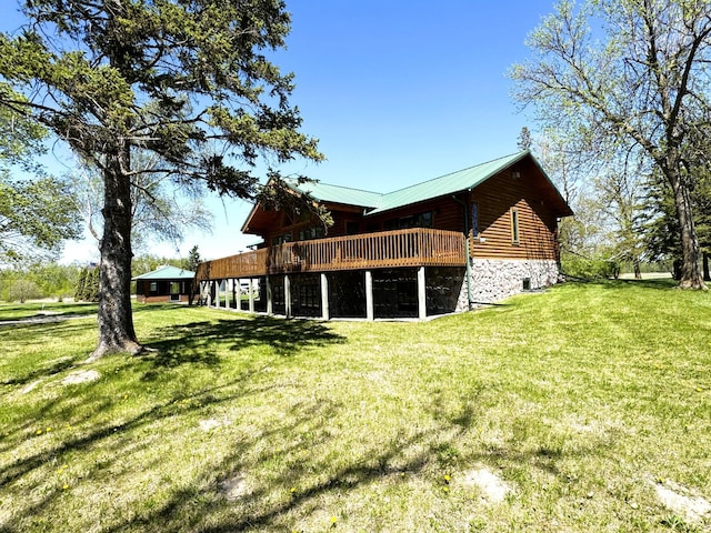 35918 410th Ave SE, Queen Twp, MN 56542 - back of property featuring a deck and a yard