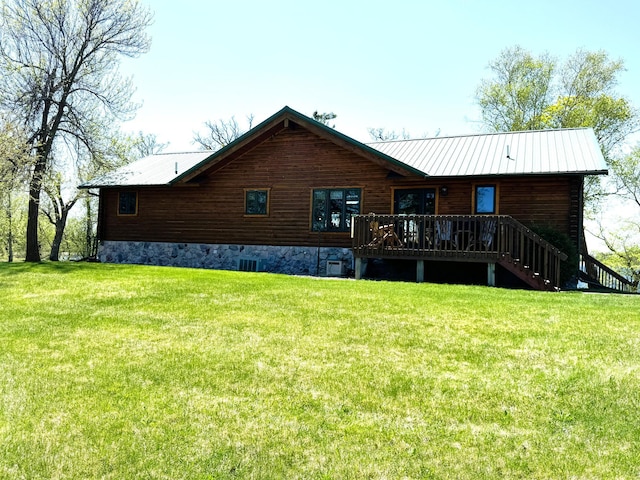 35918 410th Ave SE, Queen Twp, MN 56542 - back of house featuring a wooden deck, a lawn, stairs, and metal roof