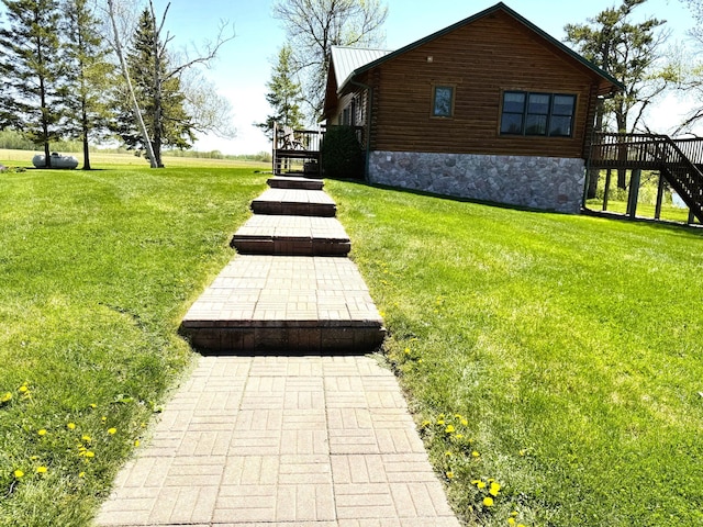 35918 410th Ave SE, Queen Twp, MN 56542 - view of green lawn featuring stairs and a deck