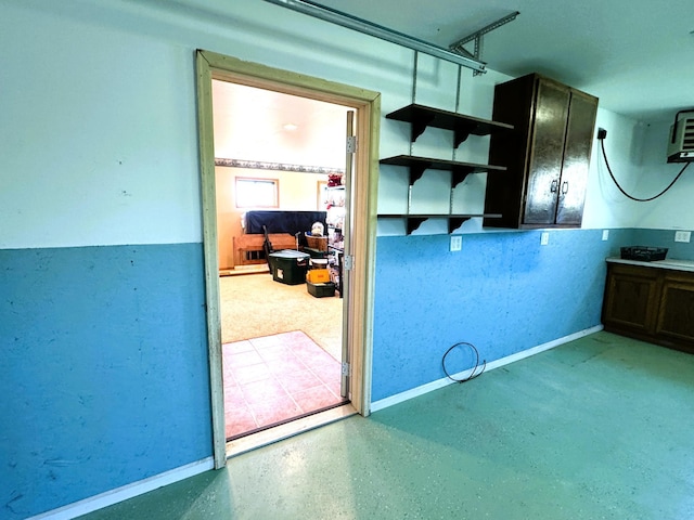35918 410th Ave SE, Queen Twp, MN 56542 - kitchen featuring baseboards, open shelves, and a heating unit
