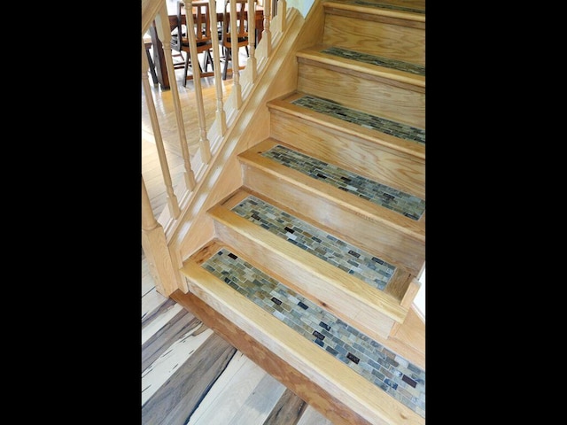 9386 Jennifer Ct, Chisago Lake Twp, MN 55013 - staircase featuring wood finished floors