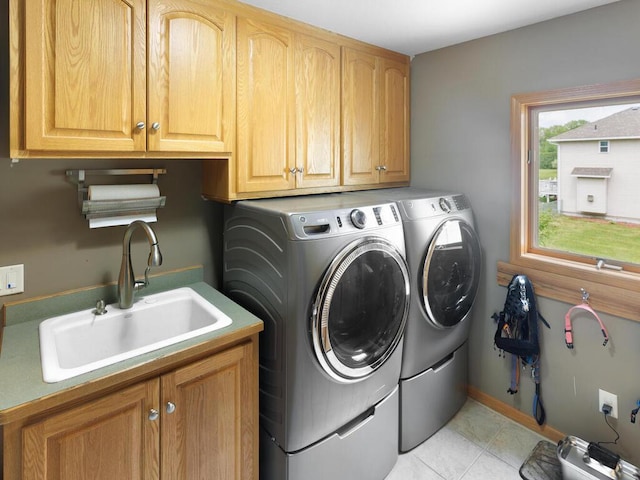 9386 Jennifer Ct, Chisago Lake Twp, MN 55013 - washroom with cabinet space, washer and dryer, and light tile patterned floors