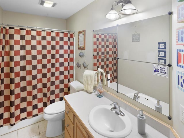 9386 Jennifer Ct, Chisago Lake Twp, MN 55013 - full bath with toilet, vanity, tile patterned floors, and a shower with shower curtain