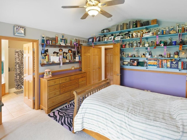 9386 Jennifer Ct, Chisago Lake Twp, MN 55013 - bedroom with vaulted ceiling, ceiling fan, and tile patterned floors
