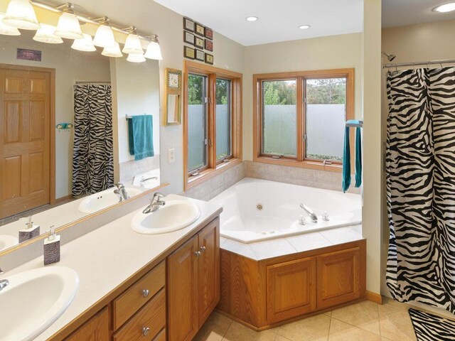9386 Jennifer Ct, Chisago Lake Twp, MN 55013 - bathroom featuring double vanity, a tub with jets, a shower with shower curtain, tile patterned flooring, and recessed lighting