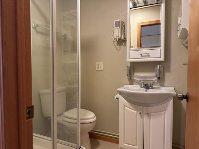 19103 County 4, Henrietta Twp, MN 56470 - bathroom with toilet, vanity, and a stall shower