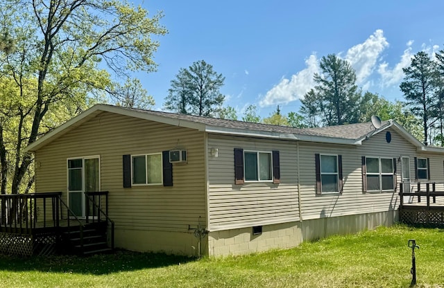 19103 County 4, Henrietta Twp, MN 56470 - view of property exterior featuring a deck, a yard, crawl space, and roof with shingles