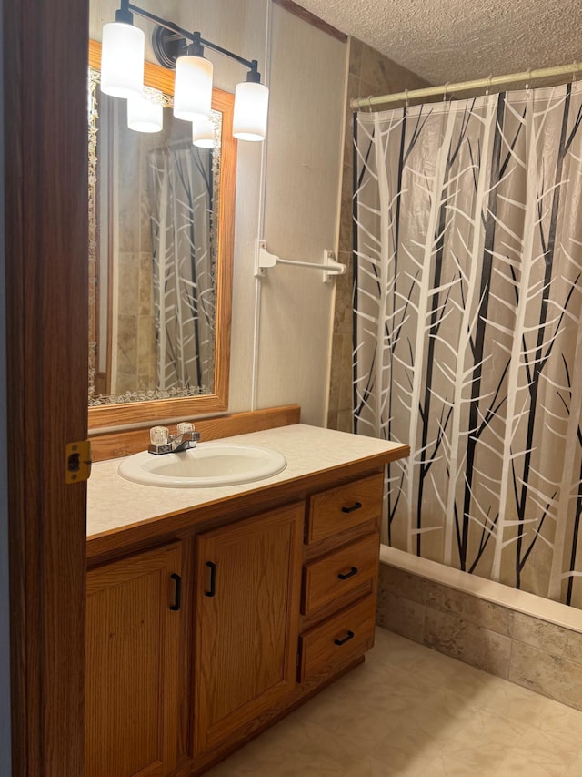 19103 County 4, Henrietta Twp, MN 56470 - bathroom with vanity, a textured ceiling, and a shower with shower curtain
