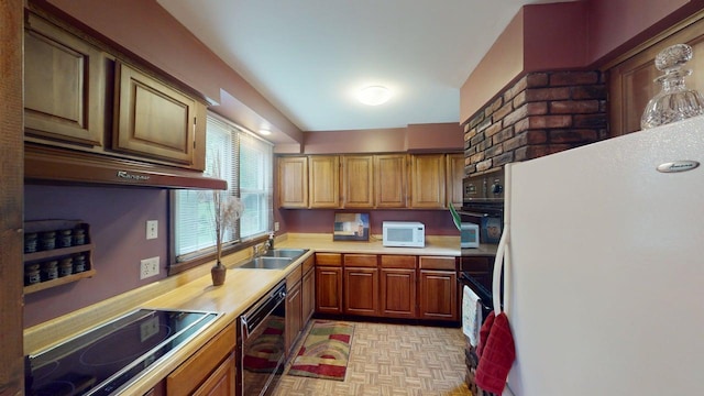 2559 Westview Ter, Hopkins, MN 55305 - kitchen featuring black appliances, light countertops, under cabinet range hood, and brown cabinets