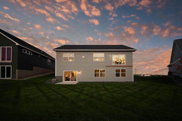 20105 Glenbrook Path, Lakeville, MN 55044 - rear view of property featuring a lawn and a patio