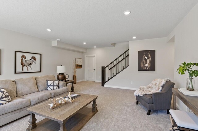 20105 Glenbrook Path, Lakeville, MN 55044 - living room featuring light colored carpet, stairs, recessed lighting, baseboards, and a textured ceiling