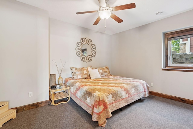 12187 Dunkirk St NE, Blaine, MN 55449 - carpeted bedroom featuring baseboards and a ceiling fan
