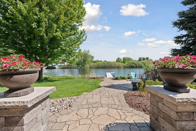 12187 Dunkirk St NE, Blaine, MN 55449 - view of patio with a water view