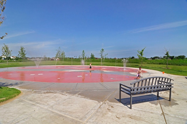 12187 Dunkirk St NE, Blaine, MN 55449 - view of swimming pool with a yard