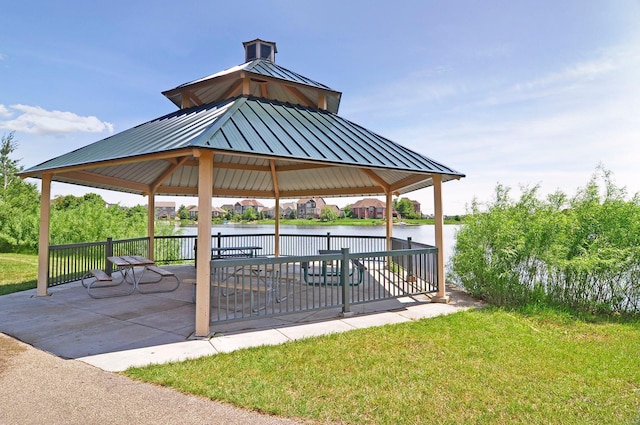 12187 Dunkirk St NE, Blaine, MN 55449 - surrounding community featuring a gazebo, a water view, a lawn, and a patio