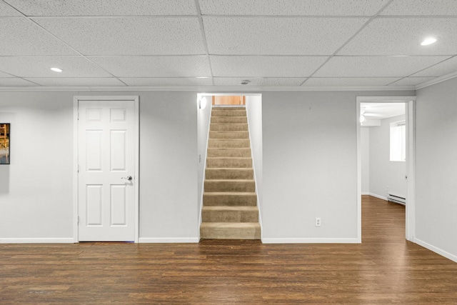 1409 Smith Ave S, West Saint Paul, MN 55118 - below grade area featuring wood finished floors, a paneled ceiling, stairs, recessed lighting, and ornamental molding