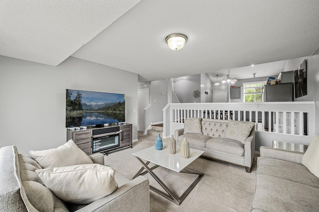 1527 Dublin Ct, Shakopee, MN 55379 - living area featuring carpet flooring, a textured ceiling, stairway, and a chandelier
