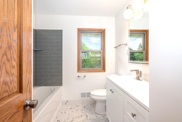 328 County Road B2 W, Roseville, MN 55113 - bathroom with marble finish floors, toilet, vanity, and baseboards