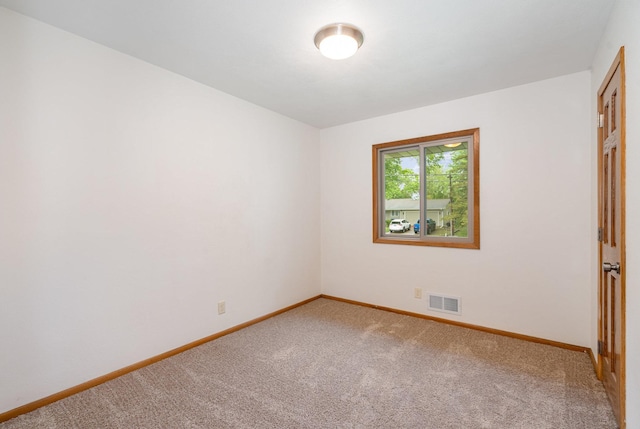 328 County Road B2 W, Roseville, MN 55113 - carpeted spare room featuring baseboards