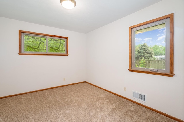 328 County Road B2 W, Roseville, MN 55113 - spare room with carpet floors and baseboards