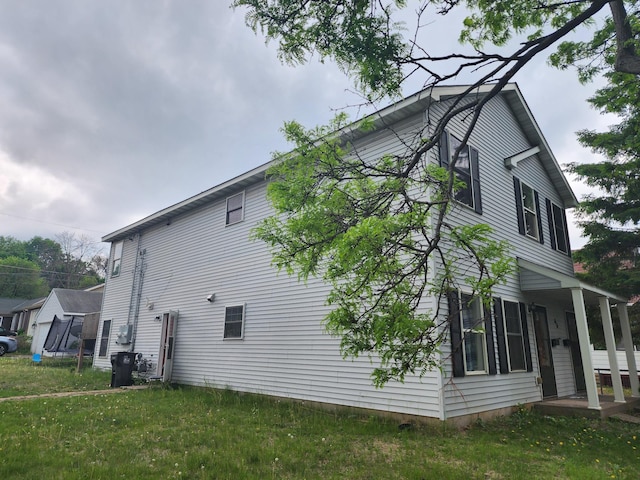 66 Stevens St E, Saint Paul, MN 55107 - view of side of property with a yard