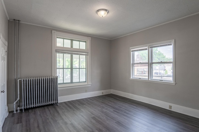 410 Baker St W, Saint Paul, MN 55107 - unfurnished room featuring radiator heating unit, crown molding, dark wood-style floors, healthy amount of natural light, and a textured ceiling